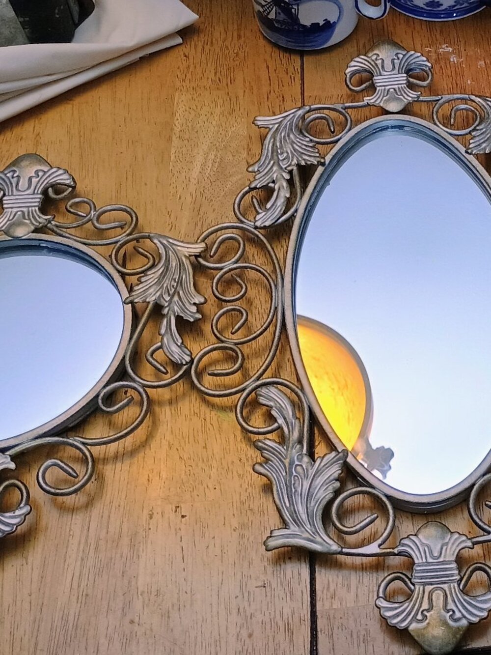 3 ornate fleur de lis mirrors